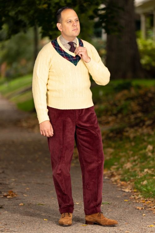 Raphael wearing a knit sweater paired with the maroon corduroy trousers-_R5_9114