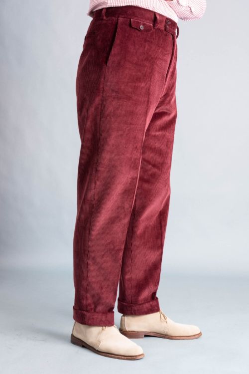 Right side angle front view of the Maroon corduroy trousers-_R5_8601