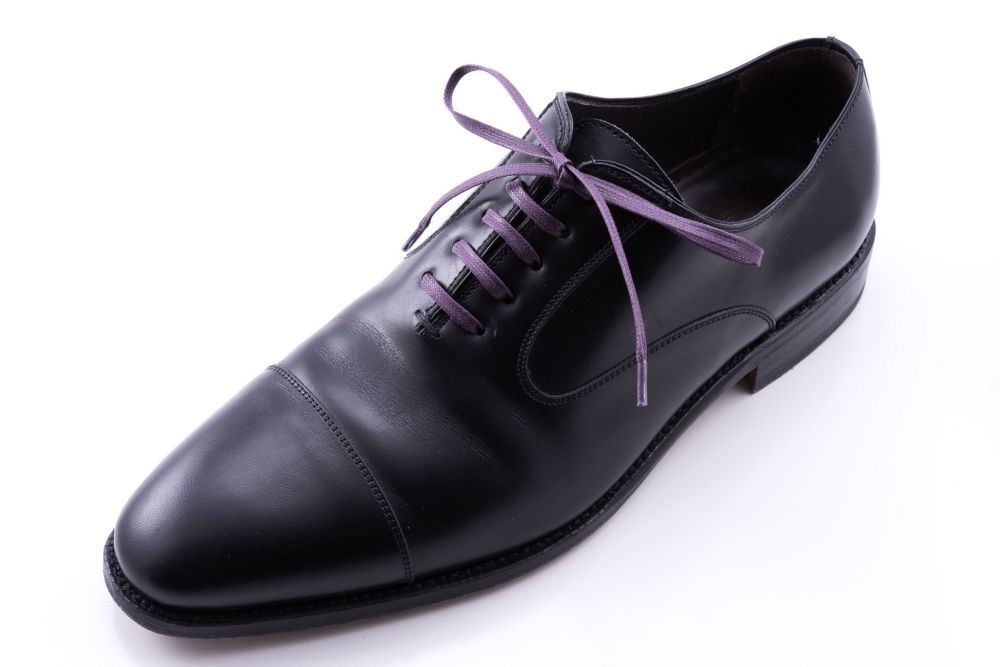 Angled shot Purple Flat Waxed Cotton Made in Italy - Luxury Dress Shoe Laces by Fort Belvedere