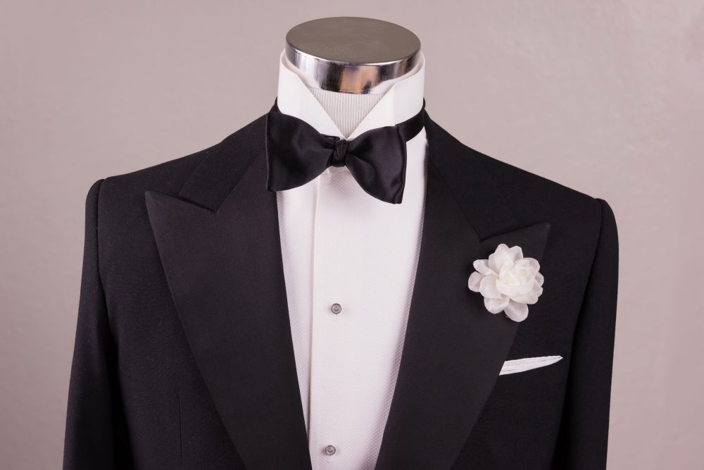 Black Tie with White Spray Rose Boutonniere by Fort Belvedere