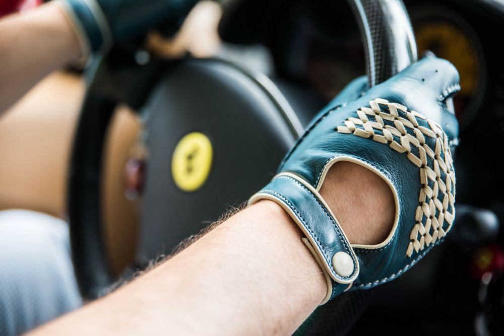 Driving Gloves in action in a Ferrari