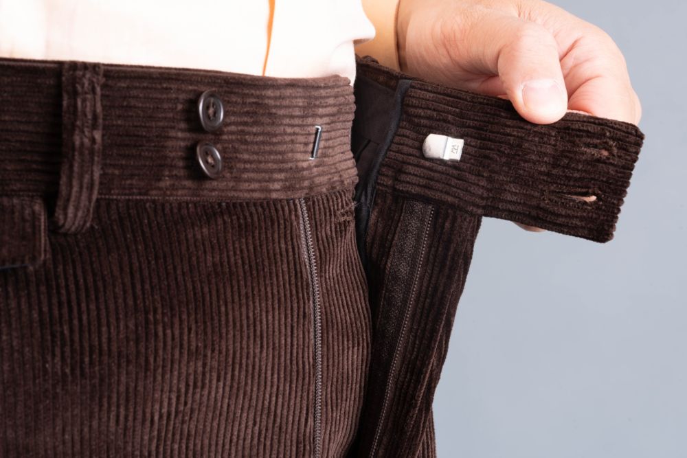 Dark Brown Corduroy Zip-Fly, and two-button waistband.