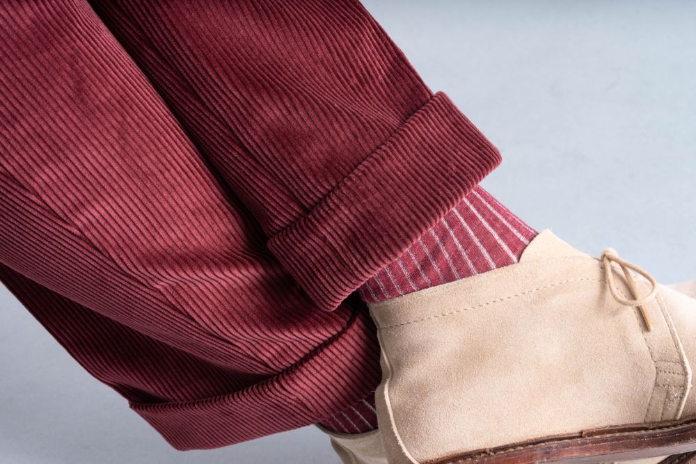 Maroon Stancliffe Corduroy Trousers by Fort Belvedere paired with Shadow Stripe Ribbed Socks Burgundy and Light grey by the same brand.