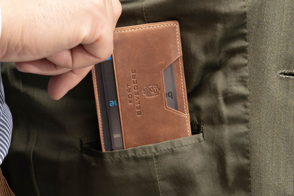 Four Card Carrier Slim Wallet in Saddle Brown Montecristo Leather has an ultra-slim profile. 
