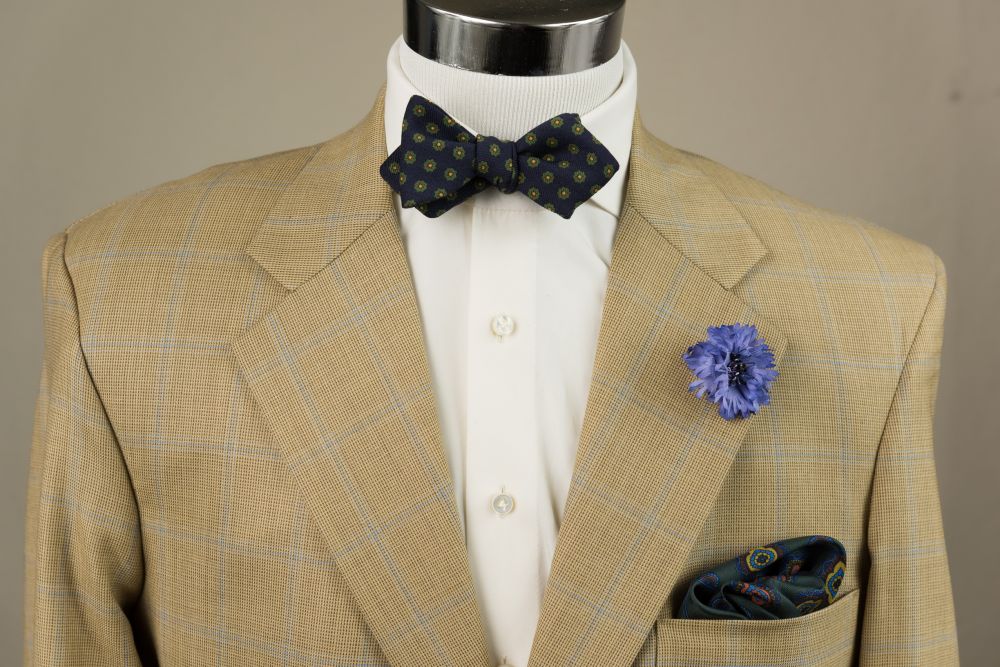 Wool Challis Bow Tie in Navy Blue with Green & Yellow Pattern & Blue Cornflower Boutonniere - Fort Belvedere