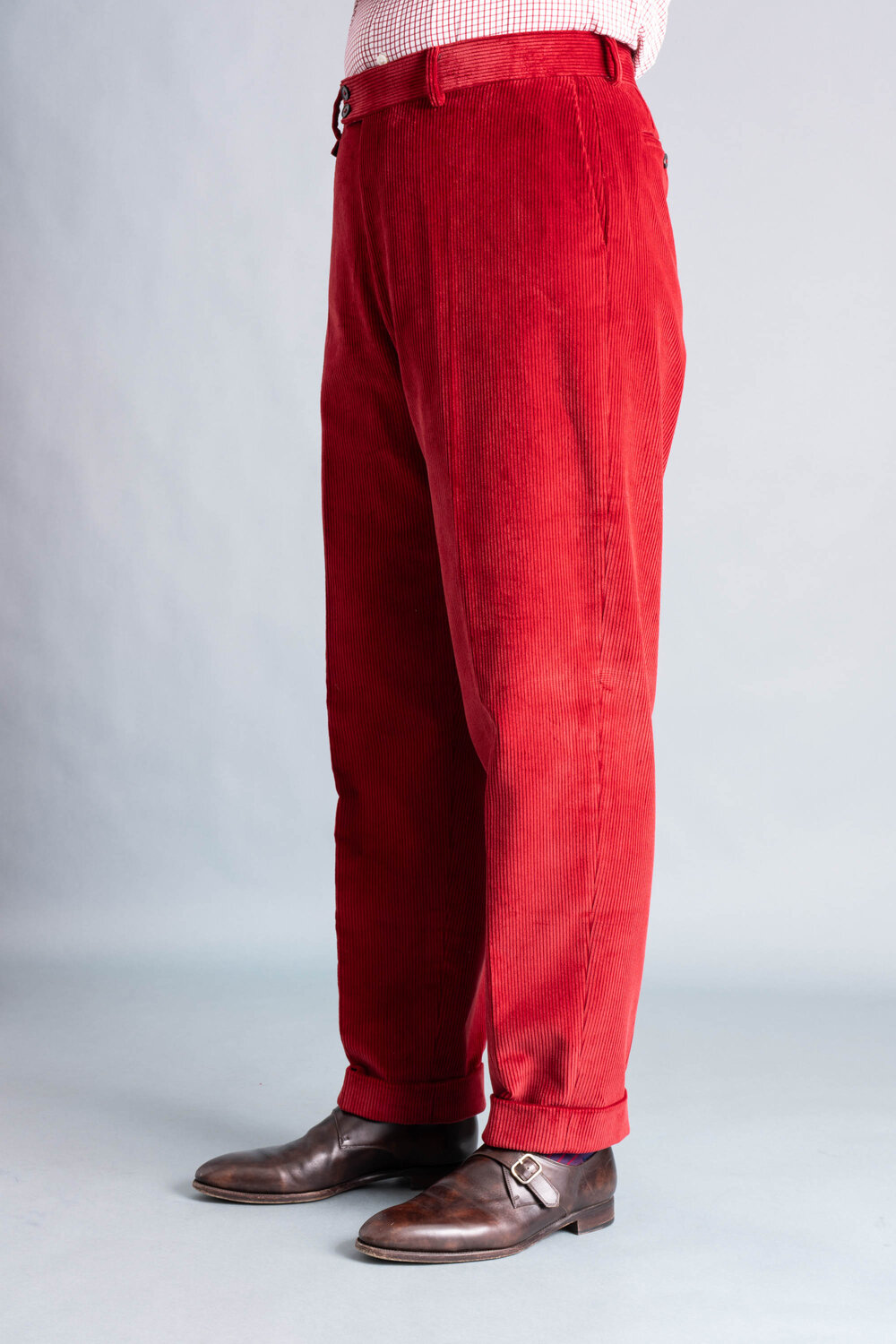 Left side angle front view of the Garnet red corduroy trousers-_R5_8607