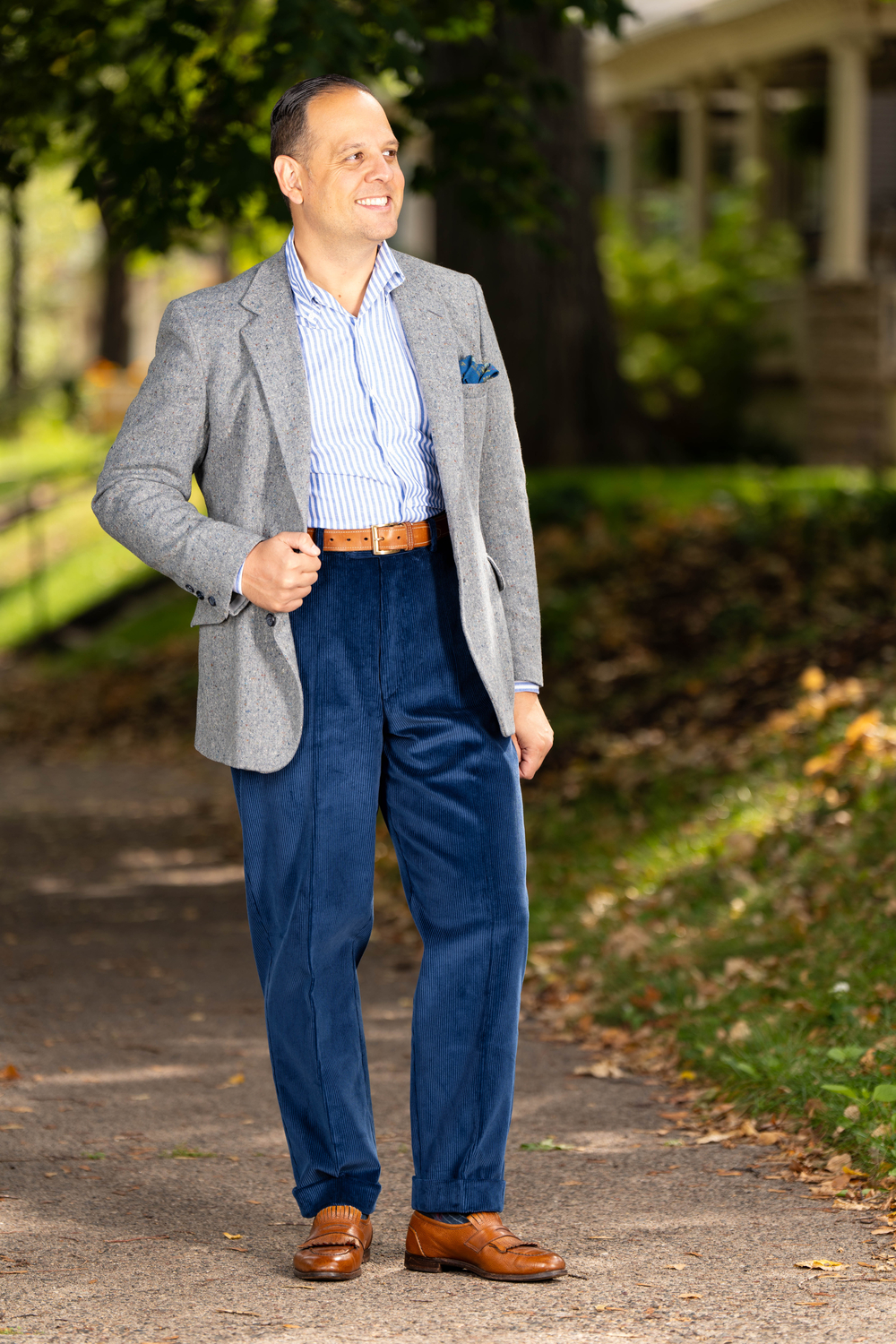 Raphael wearing Stancliffe Corduroy Flat Front Trouser in Infantry Blue