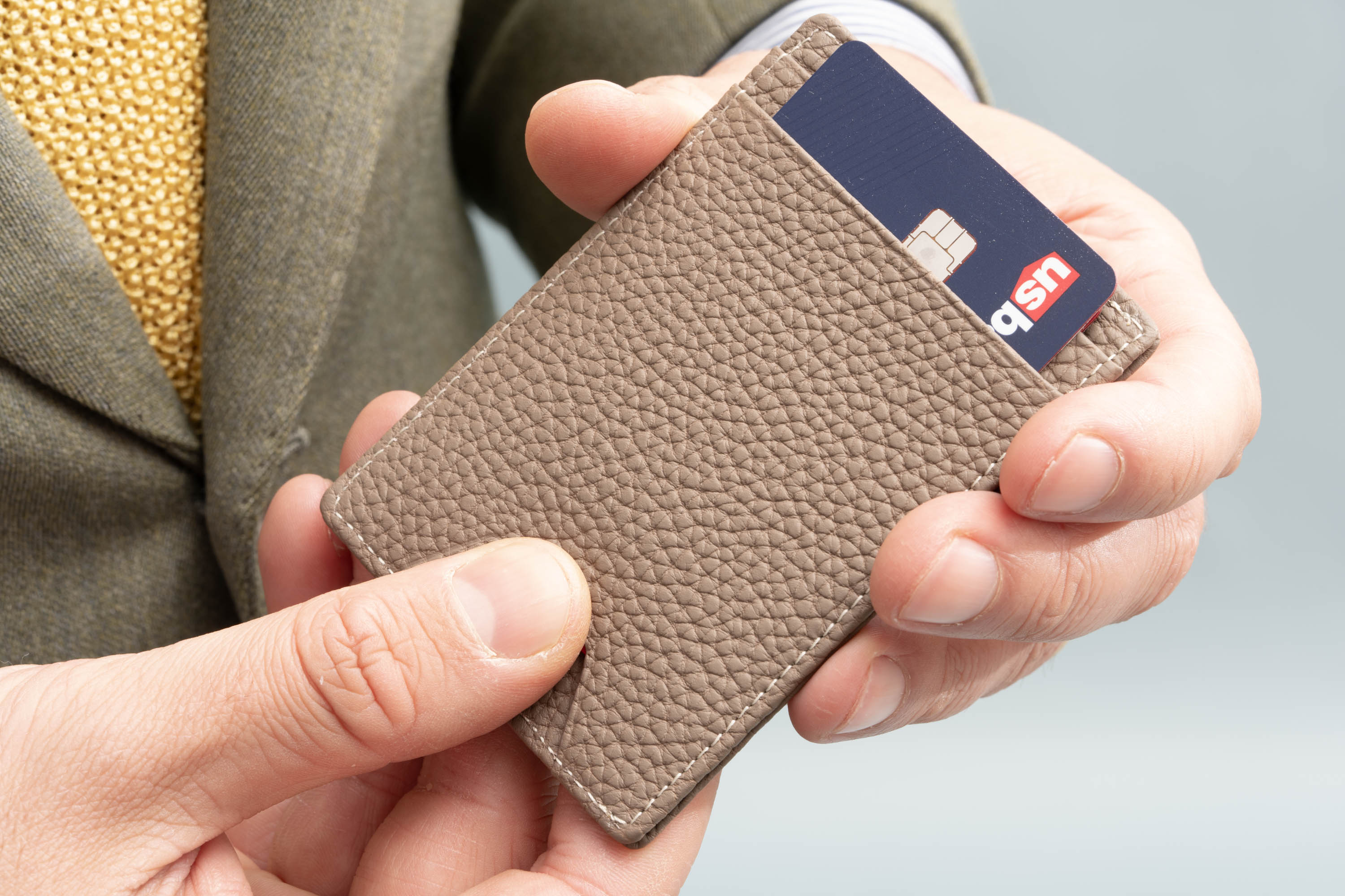 Slim Wallet - 4CC - Boardroom Taupe Togo Full-Grain Leather comes with an RFID blocking feature. 