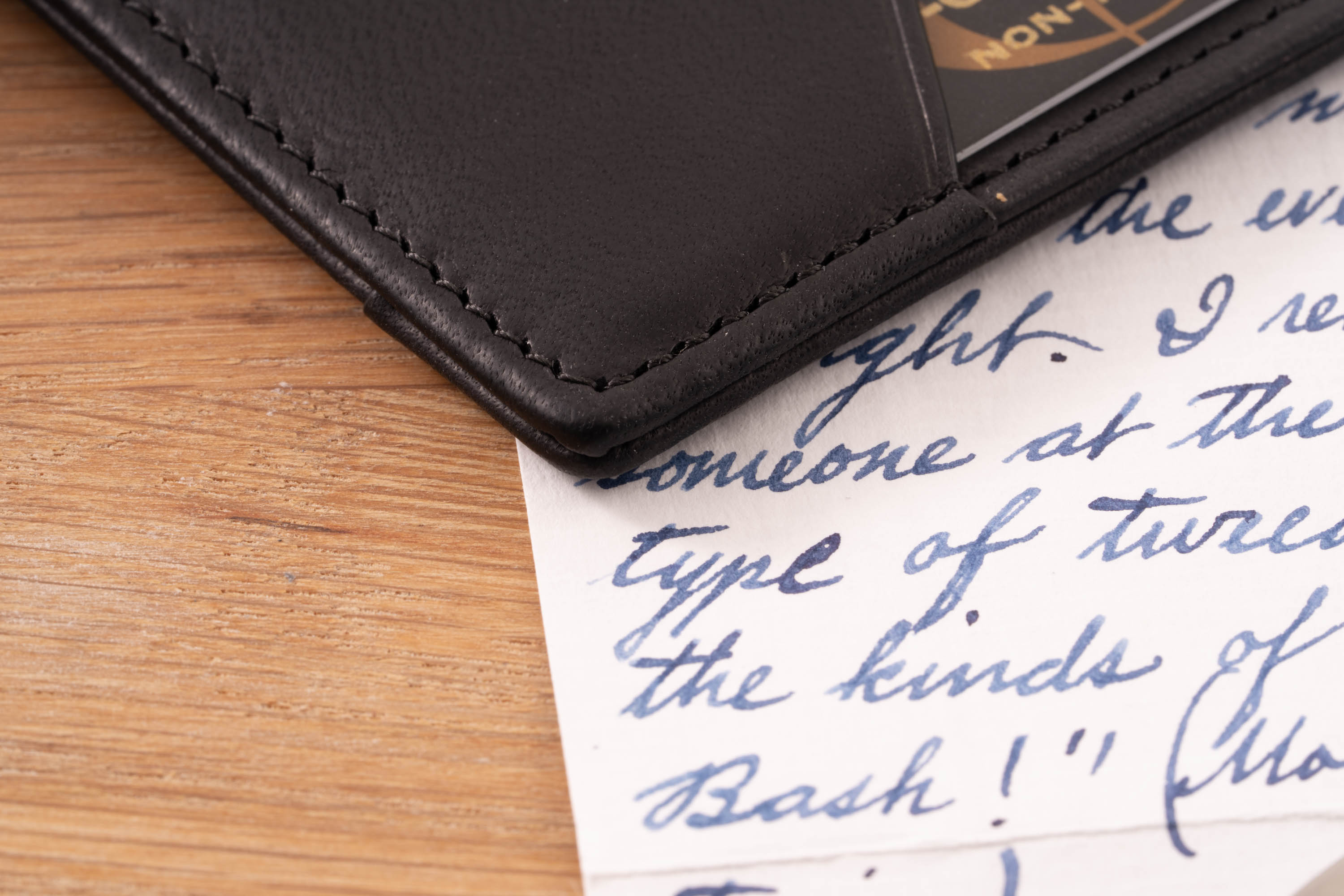 Slim Wallet - 4CC - Americana Black Full-Grain Leather has smooth corners and tone-on-tone stitching. 