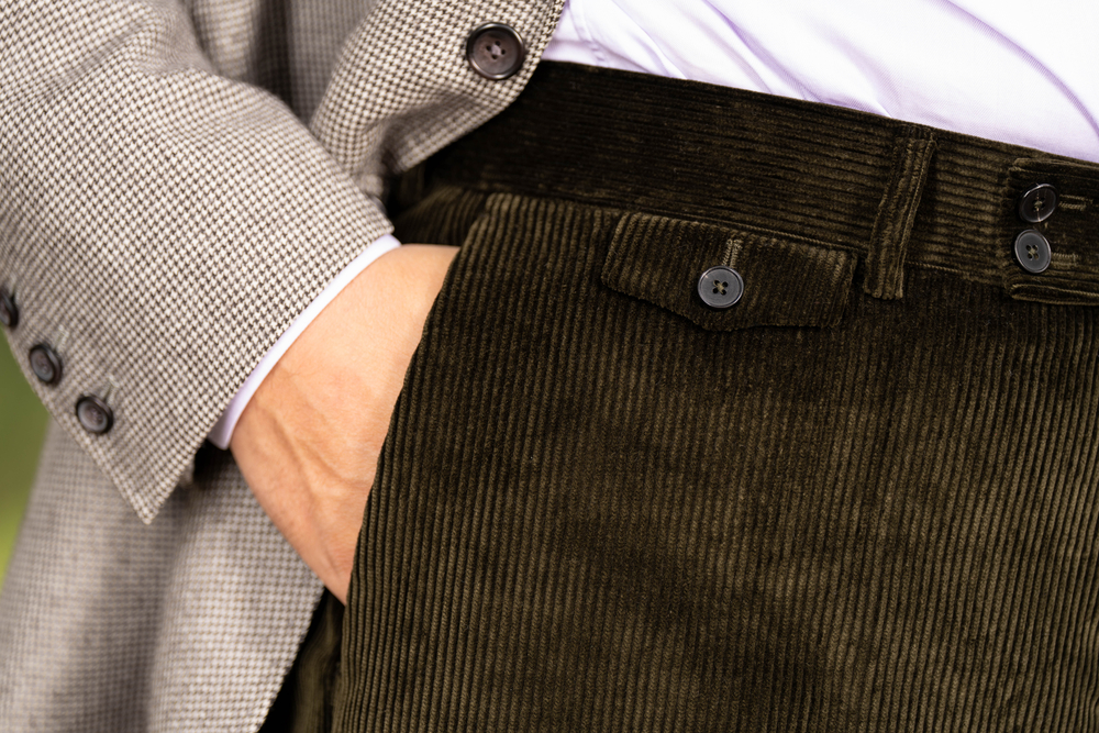 Front pocket view of the Dark Olive Corduroy trousers. 