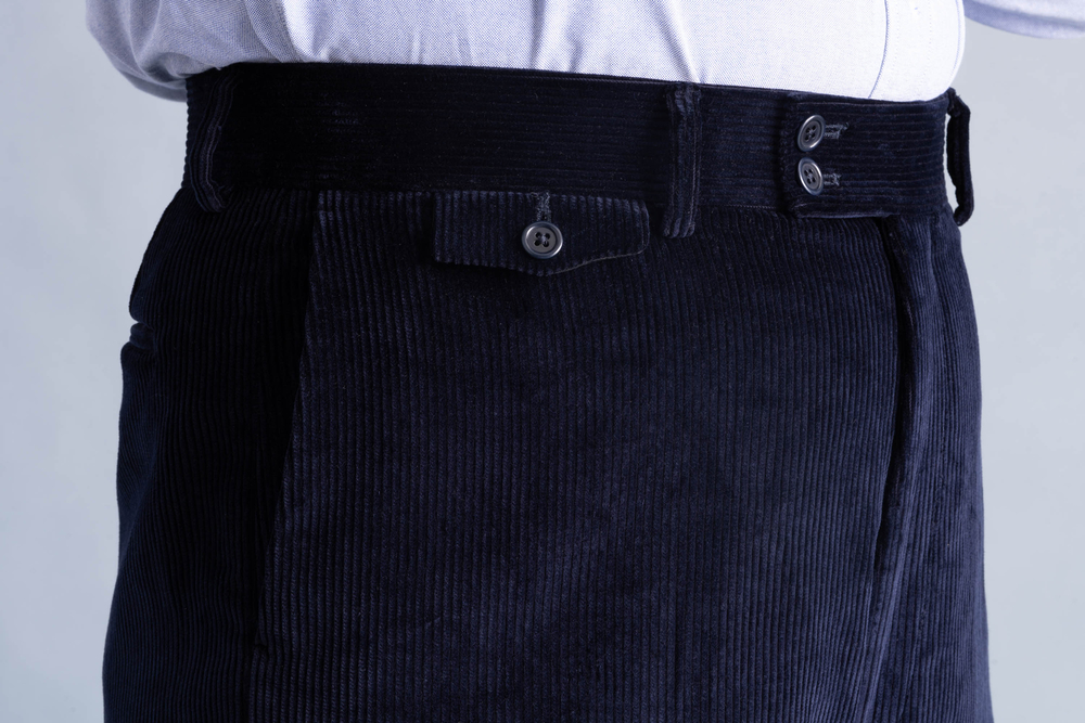 Details of the flapped ticket pocket on Midnight Blue Corduroy Trousers 