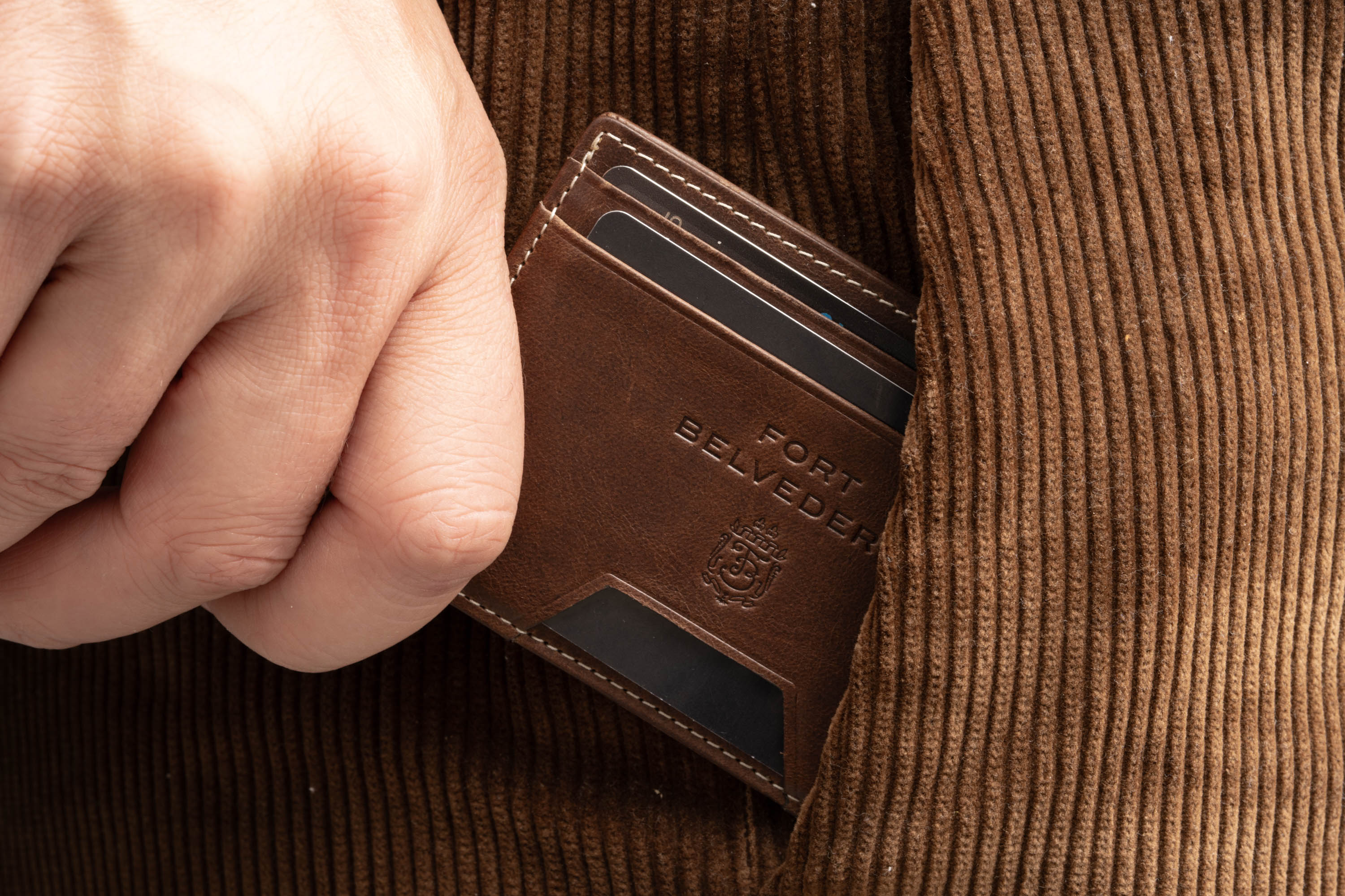 The Montecristo Antique Mahogany Full-Grain Leather 4CC Wallet is tastefully embossed with the Fort Belvedere branding. 