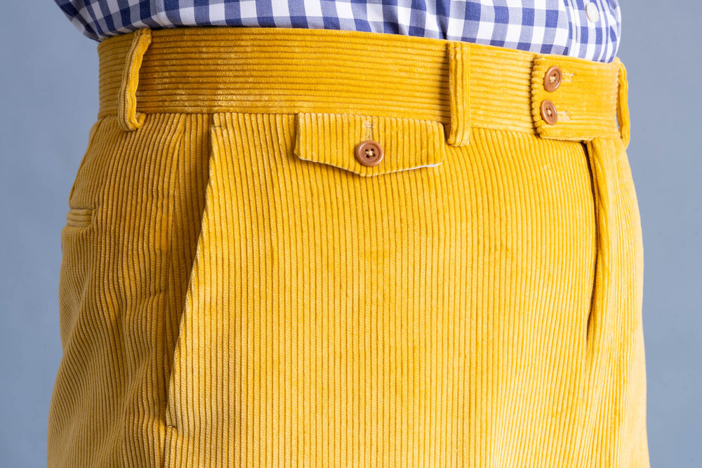 Top part detailed view of the Goldenrod Corduroy Trousers.